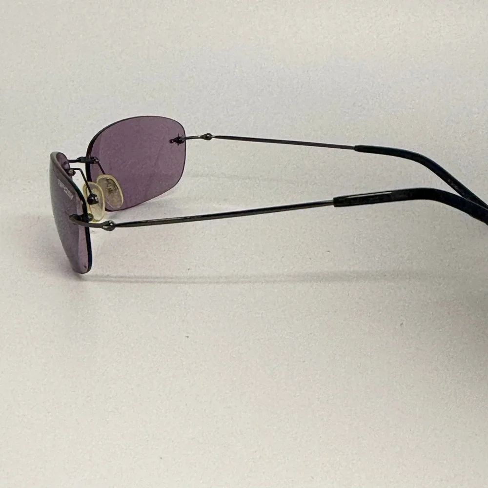 Tifosi Fade T-F830 Rimless Sunglasses Purple Tint Lens Sport Wrap Metallic Frame